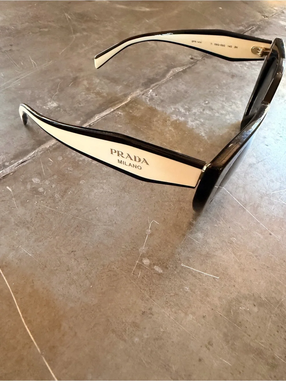 Prada Black Cat-Eye Sunglasses with Silver Temples